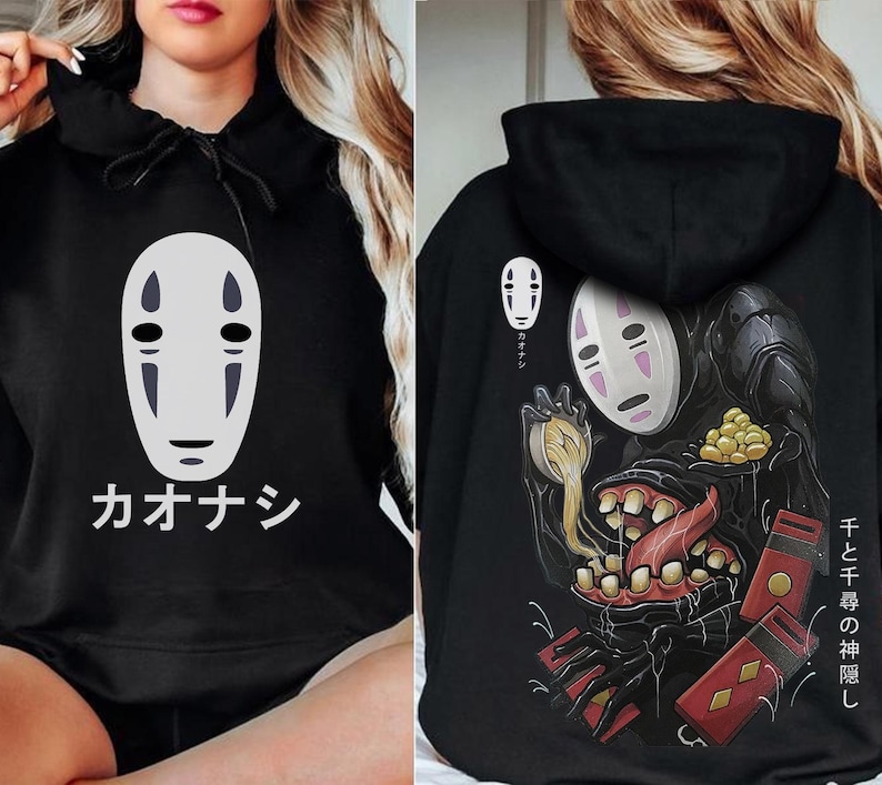 May include: Black hoodie featuring a white and gray graphic of a character from Spirited Away, with Japanese text. The back of the hoodie displays a larger illustration of the character with additional Japanese text and imagery.