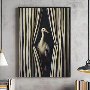 May include: A framed art print featuring a white bird with a long neck and beak, standing between black and cream striped curtains. The bird has gray speckled markings. The artwork is set against a dark background.
