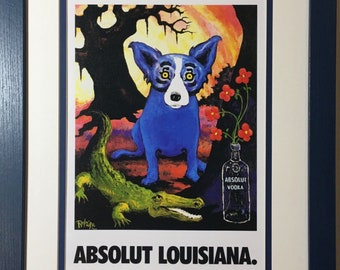 George Rodrigue Blue Dog Absolut Vodka Print Ad - Matted in NAVY BLUE frame -12.5" x 15.5"