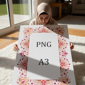 May include: A white A3 print with a decorative border in shades of pink, orange, and gold. The print features the text "PNG" at the top and "A3" at the bottom. The print is held up by a person.