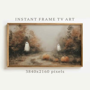 May include: A framed digital print featuring a spooky autumn scene with two white ghosts, pumpkins, and fall foliage. The text "INSTANT FRAME TV ART" and "3840x2160 pixels" are displayed on the image.