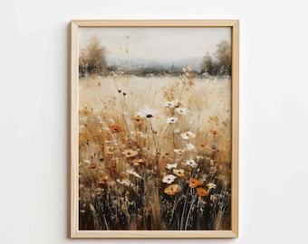 May include: A framed art print featuring a field of wildflowers in shades of orange, white, and brown. The artwork has a soft, painterly style, with a light brown wooden frame.