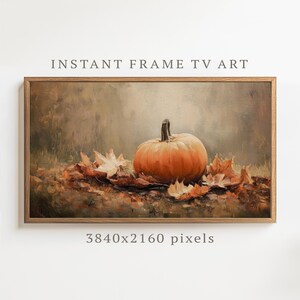 May include: A digital artwork titled INSTANT FRAME TV ART 3840x2160 pixels featuring an oil painting style depiction of a single orange pumpkin resting on a bed of fallen autumn leaves in shades of brown, gold, and tan against a muted background.