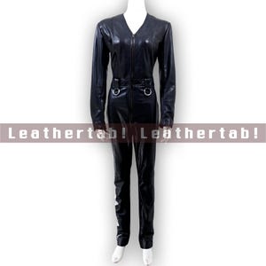 Women&#39;s Premium Sheepskin Leather Jumpsuit – Black Full-Body Zipper Suit with Ring Accents for Styling | Mature