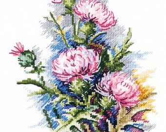 May include: A cross-stitch design of pink thistle flowers with green leaves and stems. The needlework features detailed shading and a variety of colors, including blue, purple, and yellow, against a white background.