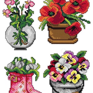 May include: A cross-stitch design showing four floral arrangements. Includes pink flowers in a white vase, red poppies in a brown pot, white flowers in a pink boot, and pansies in a grey bucket. The design is on a white background.