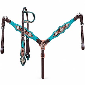 May include: A horse breast collar and headstall set featuring dark brown leather straps, vibrant turquoise suede accents, and a leopard print pattern. The tack is decorated with clear crystal studs and copper-toned metal hardware.