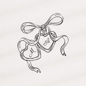 May include: A black and white line art illustration of two heart-shaped lockets suspended from a decorative ribbon tied in a bow. The left locket features the letter M in cursive script, and the right locket features the letter A in cursive script.