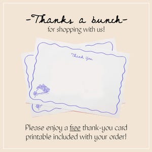 May include: Two white thank-you cards with a blue scalloped border and floral illustration. The cards have the words "Thank You" written in blue script. The text "-Thanks a bunch- for shopping with us!" is at the top.