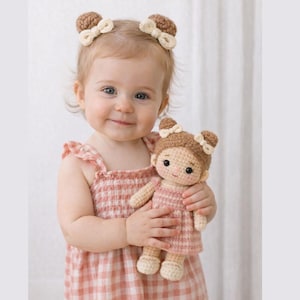 May include: A set of three ceramic mugs with a speckled, matte finish. The mugs are in shades of cream, light gray, and dark gray. Each mug has a simple, minimalist design and a rounded handle.