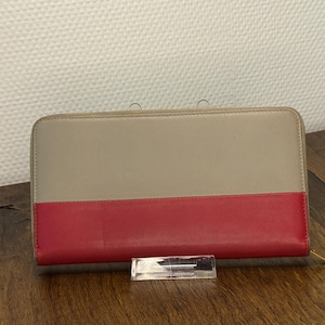 Cartera larga con cremallera en el contorno de piel beige y burdeos de Celine para mujer