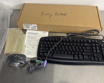 Tastiera Microsoft Basic 1.0A PS/2 X800468-208 con mouse, testata e funzionante.