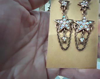 Kirks Folly copper star earrings with ab clear stones , and chains 2.25 inches long