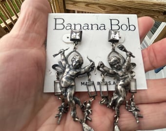 Banana Bob silver ox Cupid earrings with clear stones. 3 inches