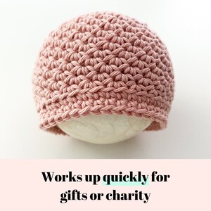 May include: A pink crocheted beanie hat, shown on a white form. The text "Works up quickly for gifts or charity" is below the hat.