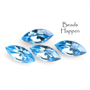 SWAROVSKI 15x7mm Light Sapphire Blue Crystal Navettes, Faceted Fronts, Foiled Point Backs, Article 4200/2 15x7 Navettes, Navette, Quantity 4