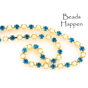 18pp 2.5mm Swarovski Crystal & Glass Pearl Gold Plated Chain, Prong Set Light Sapphire Blue Crystals, Quantity: sold by linear foot
