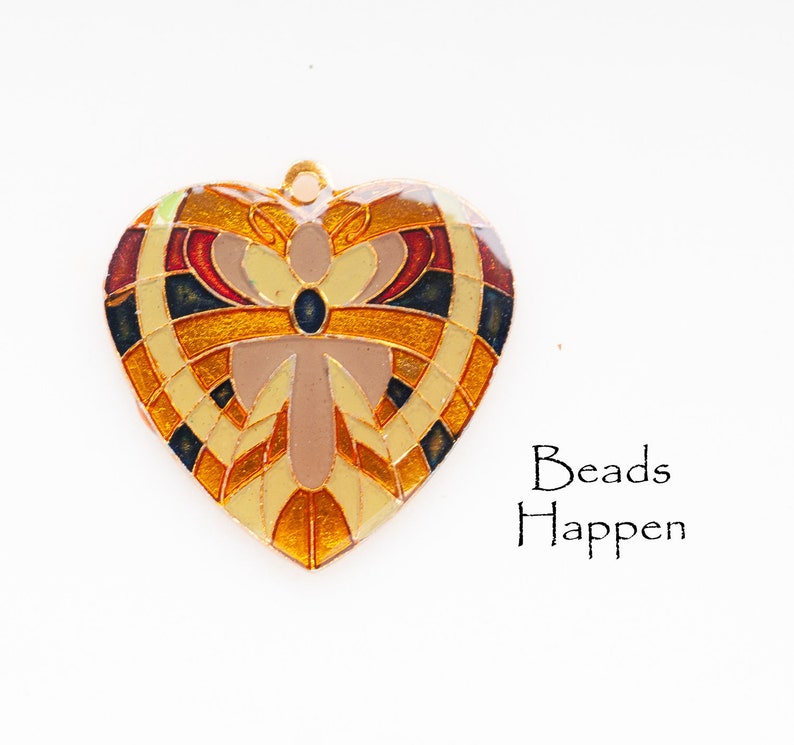 Clear Encased, F1-3-3 30mm Colorful Heart Pendant with Golden Metal Base Creams and Reds Colored Blocking Pattern Quantity 1