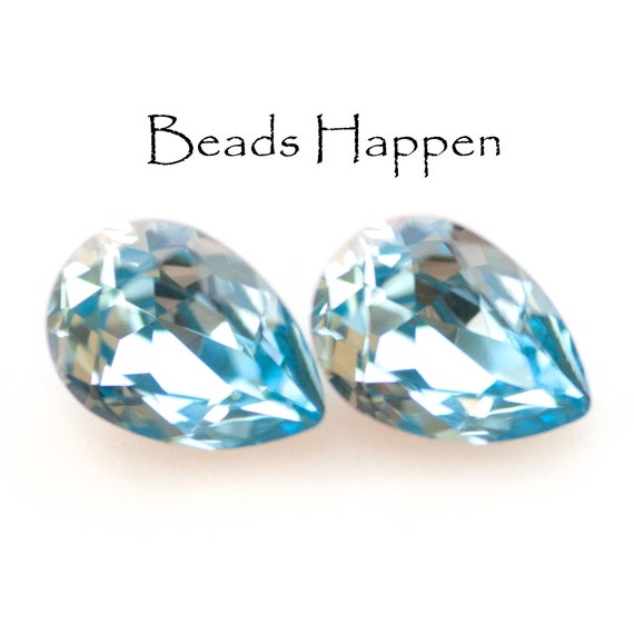 SWAROVSKI Crystal, 14x10mm Pears, Aquamarine Blue Silver Foil Point Backs, Austrian Crysal, Article 4320, Quantity 2