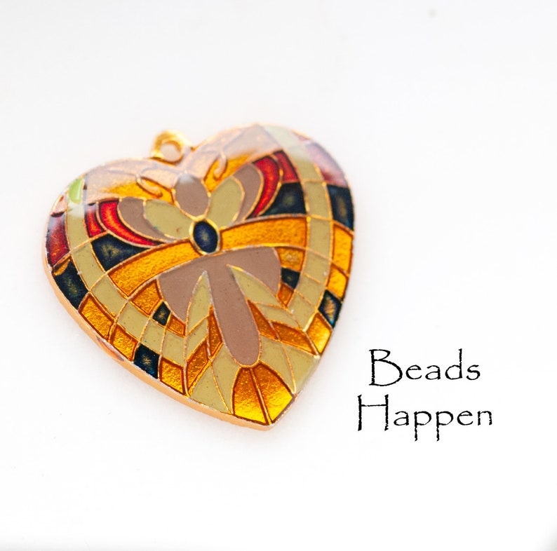 Clear Encased, F1-3-3 30mm Colorful Heart Pendant with Golden Metal Base Creams and Reds Colored Blocking Pattern Quantity 1