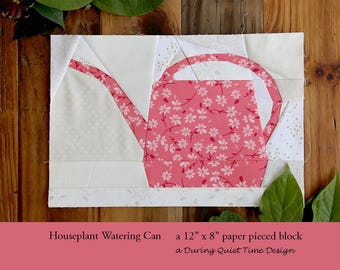 Zimmerpflanze Gießkanne Papierstückmuster