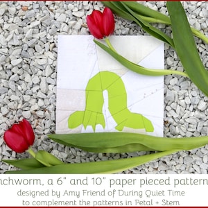 May include: A paper pieced pattern for a green inchworm, designed by Amy Friend of During Quiet Time. The pattern is available in two sizes: 6 inches and 10 inches. The pattern is designed to complement the patterns in Petal + Stem.