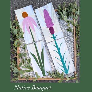 May include: Four rectangular fabric panels featuring pieced quilt designs of botanical subjects. Two panels display pink and purple flower heads with green stems and leaves, while the other two panels show long green stems and foliage on white backgrounds.