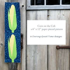 May include: A paper pieced quilting pattern for a corn on the cob design. The pattern is 6 inches by 12 inches and is a During Quiet Time design.