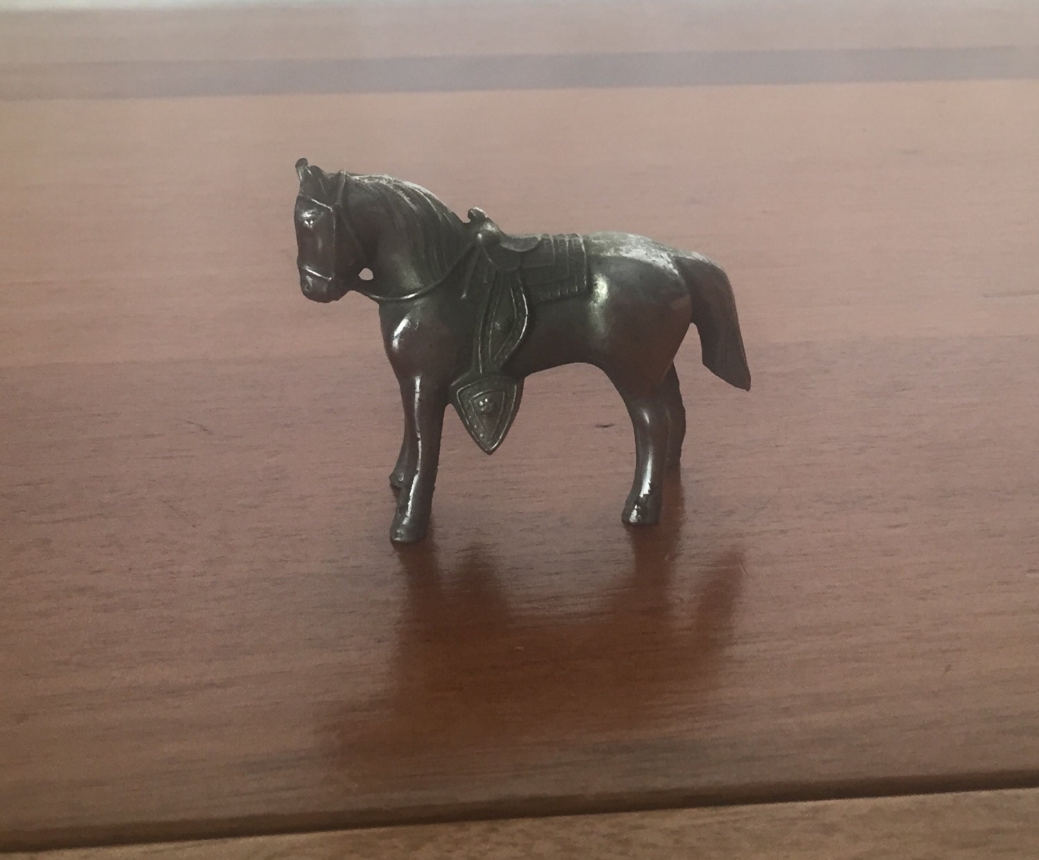 old metal horse figurines