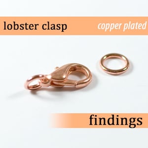 May include: Copper plated lobster clasp and jump ring. These are jewelry findings.