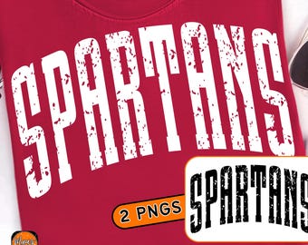 May include: A red t-shirt with the word "SPARTANS" in large, distressed white letters across the front. The design includes a PNG graphic and the text "SPARTANS PNG DESIGN".