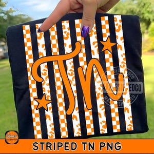 May include: Black t-shirt with an orange and white striped design, featuring the letters "TN" in orange, two orange stars, and a leopard print pattern. The text "STRIPED TN PNG" is at the bottom.