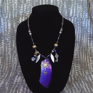 Astral Blue 2, blue and silver, gourd shard necklace, beads and charms, 21” length, with earrings