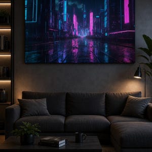 May include: A rectangular wall art print featuring a futuristic city street at night with vibrant neon blue and magenta lighting reflecting on a wet road surface. The artwork displays tall skyscrapers illuminated by glowing vertical light strips.