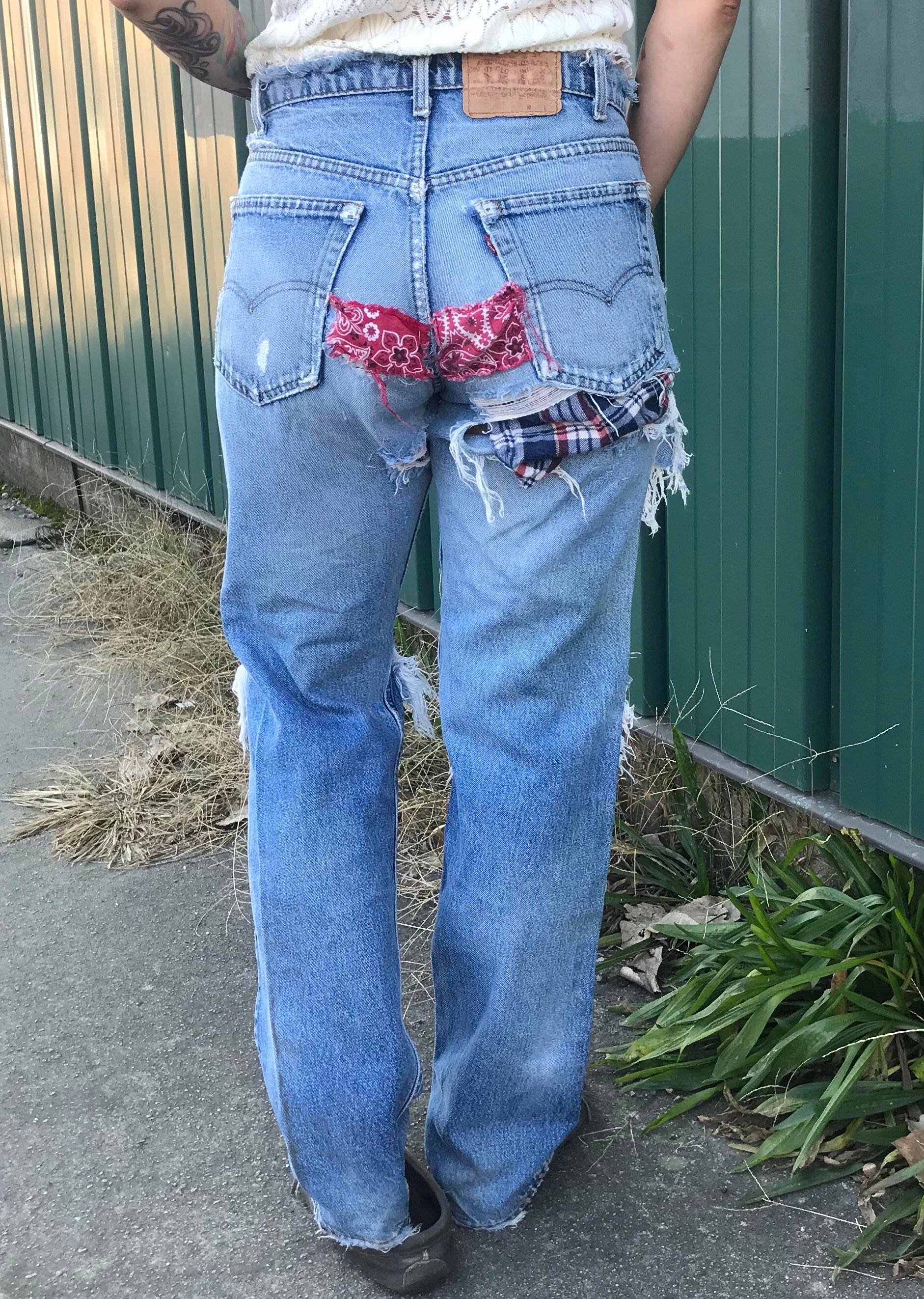 LoyaltyVintageShop Destroyed and Patched 90's Vintage Levi's Jeans - Shredded, Destroyed, Patched, Unisex, 32/33 LoyaltyVintageShop Destroyed and Patched 90's Vintage Levi's Jeans - Shredded, Destroyed, Patched, Unisex, 32/33