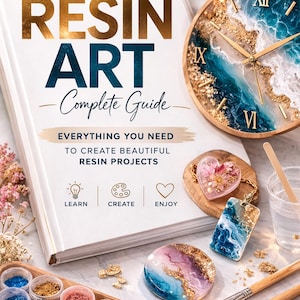 May include: A book titled "RESIN ART - Complete Guide" with a clock, resin art pieces, and art supplies. The clock has a wooden frame and a blue and gold resin design. The book cover has gold lettering.
