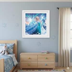 May include: A framed print featuring a cartoon character in a teal dress, set against a backdrop of a castle and aurora borealis. The artwork is displayed in a child's bedroom with a wooden bed, dresser, and snowflake decorations.