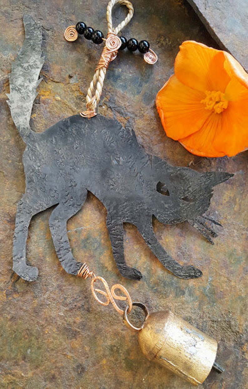 Scared black kitty copper wind chimes