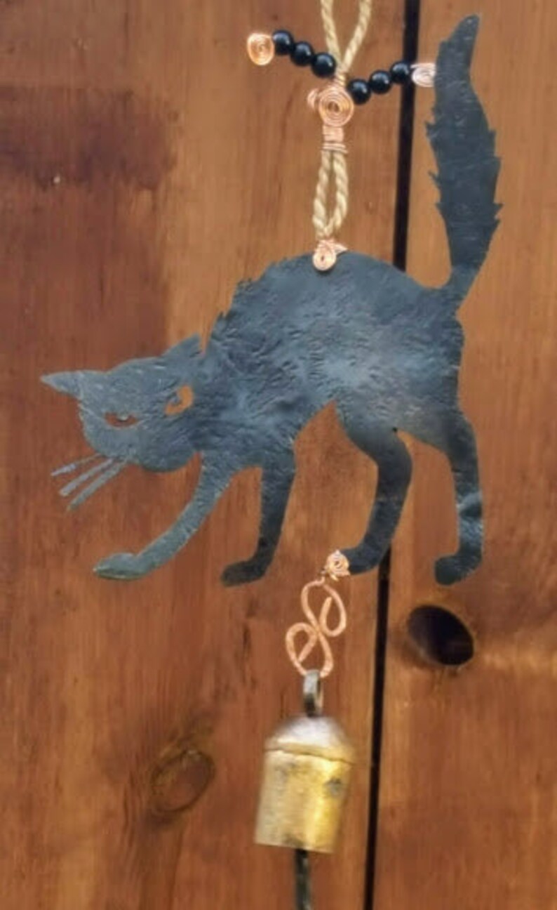 Scared black kitty copper wind chimes