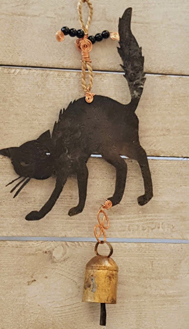 Scared black kitty copper wind chimes