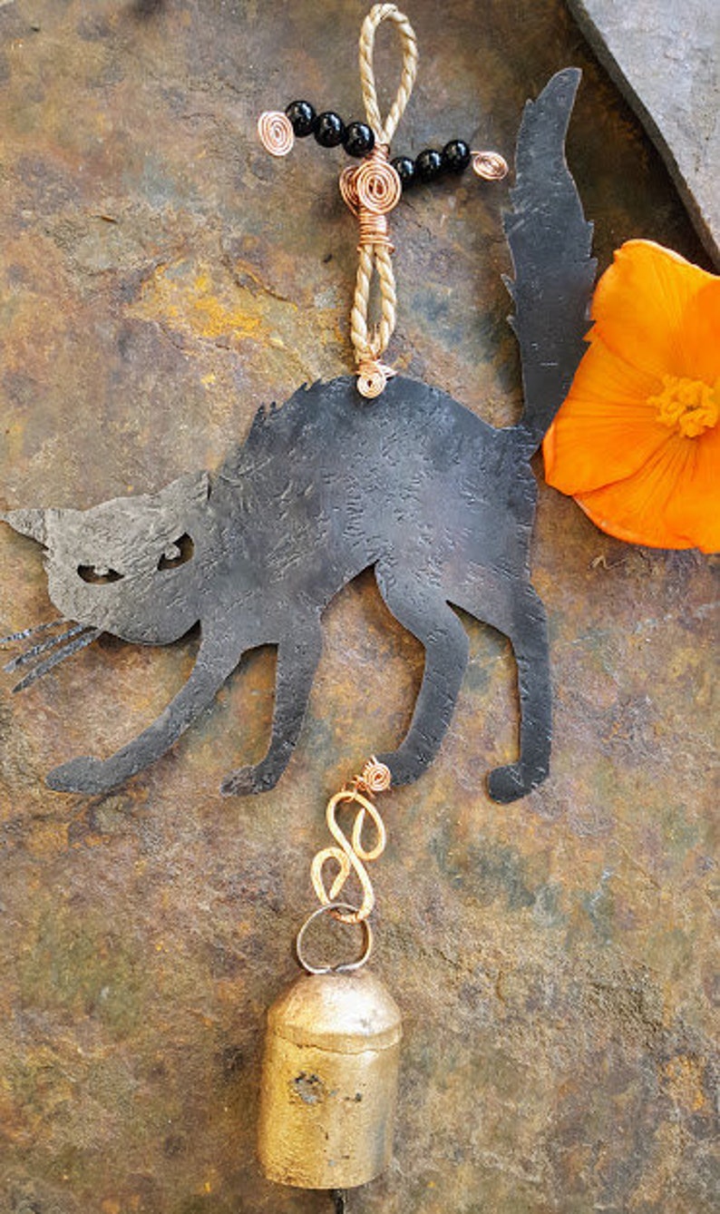 Scared black kitty copper wind chimes