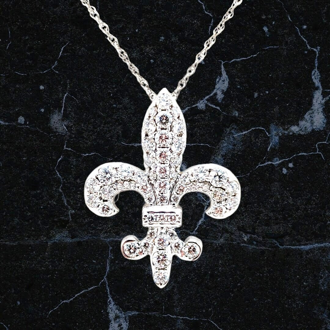 Fleur de lis diamond pendant discount