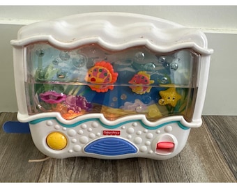 Vintage Fisher-Price Ocean Wonders aquarium wieg fopspeen muzikaal oplichtend speelgoed