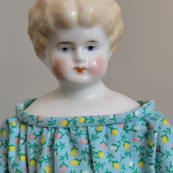 Vintage Blonde China Head Doll with Dress - Blue Painted Boots and Bows - Newer body, possible Reproduction Doll - Includes Doll Stand