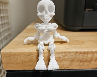 3Dプリントの関節式スケルトンキーホルダー - 不気味なハロウィーンの装飾