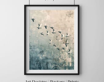 May include: A framed art print featuring a flock of birds in flight against an abstract background of blue, gray, and cream tones. The artwork is framed in a black border. The text "Quiet Paper Lab" is at the top, and "Art Designs | Posters | Prints" is at the bottom.