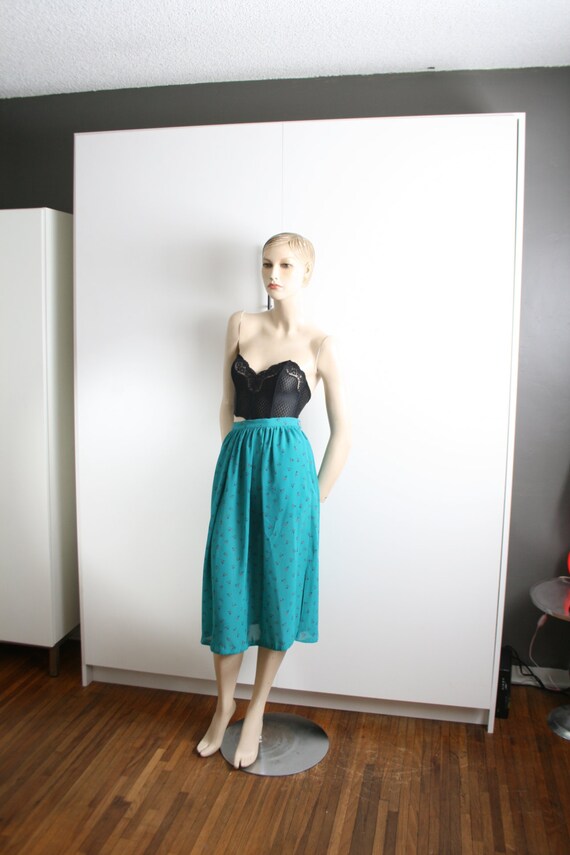 triangle geometric semi sheer teal high waist mid… - image 1