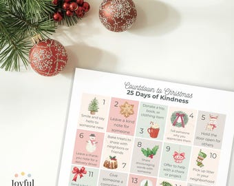 May include: A festive Christmas-themed image featuring a countdown calendar with 25 acts of kindness. The calendar is accompanied by red and silver ornaments and evergreen branches. The text on the calendar reads "Countdown to Christmas 25 Days of Kindness."