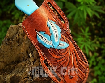 Cuchillo Bull Cutter de acero D2 hecho a mano y funda de cuero repujado tipo panqueque.
