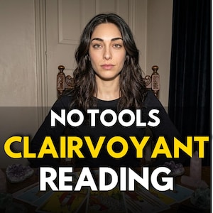 May include: A person with long dark hair wearing a black long-sleeve shirt sits behind a table with tarot cards and crystals. The text NO TOOLS CLAIRVOYANT READING is displayed in white and yellow letters over the centre of the image.
